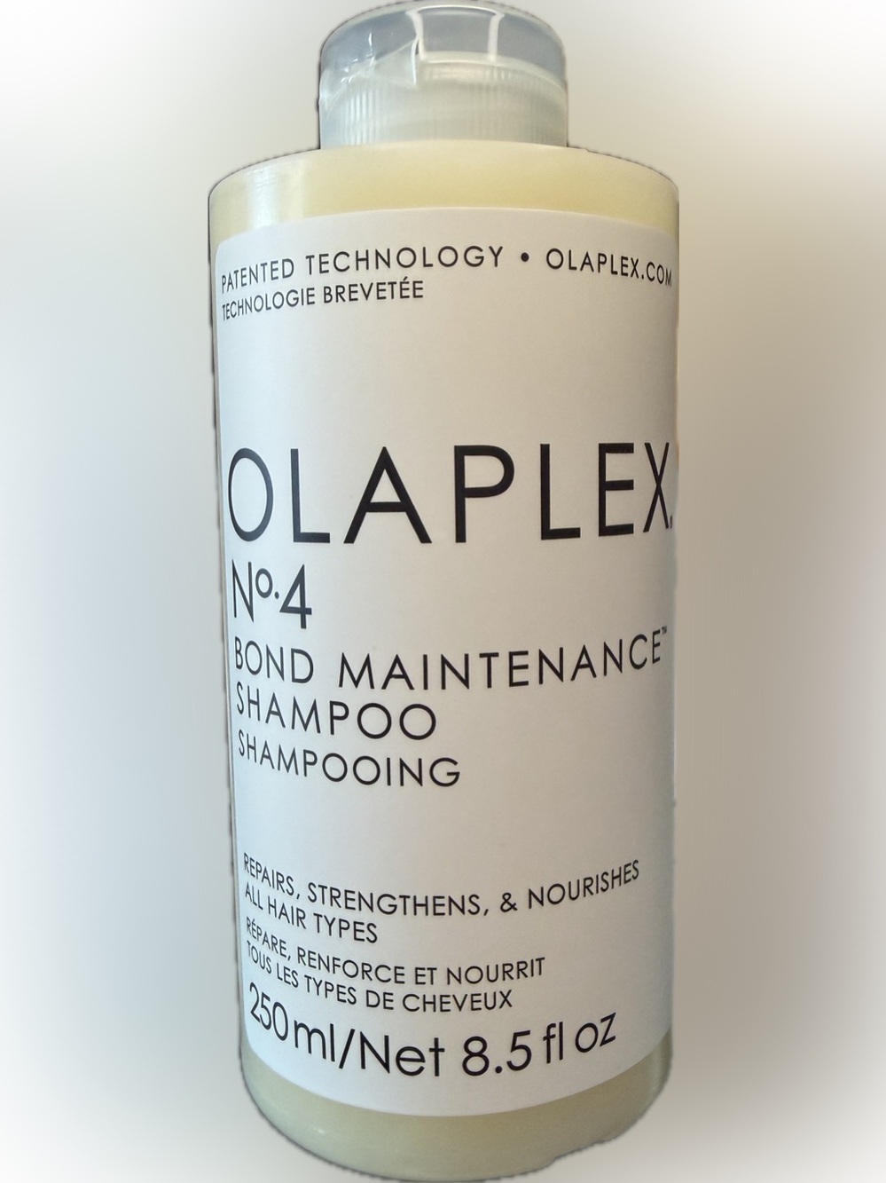 OLAPLEX No.4 Bond Maintenance Shampoo - White and Black Label